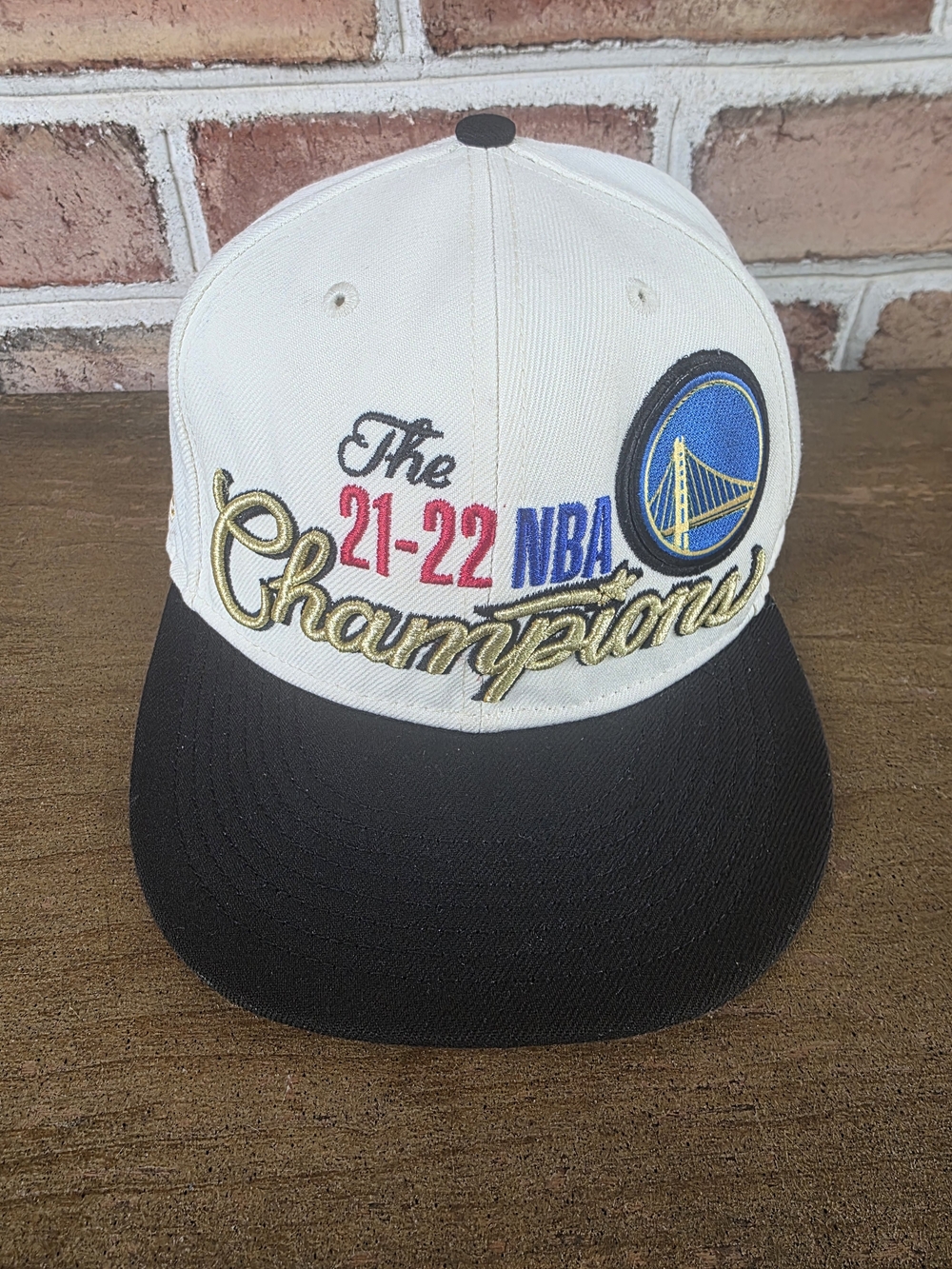 New Era White and Black "The 21-22 NBA Champions" Golden Script Hat
